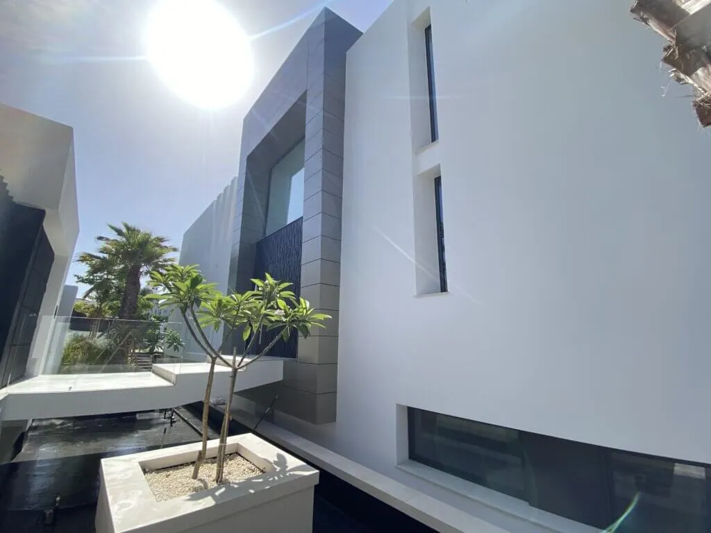 ProPERLA wall coating applied to a Spanish villa by Universal Eco Homes, showcasing a freshly cleaned and protected exterior